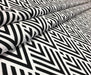 GEOMETRİK ÜÇGEN DESENLİ DİJİTAL BASKI KUMAŞ - SİYAH